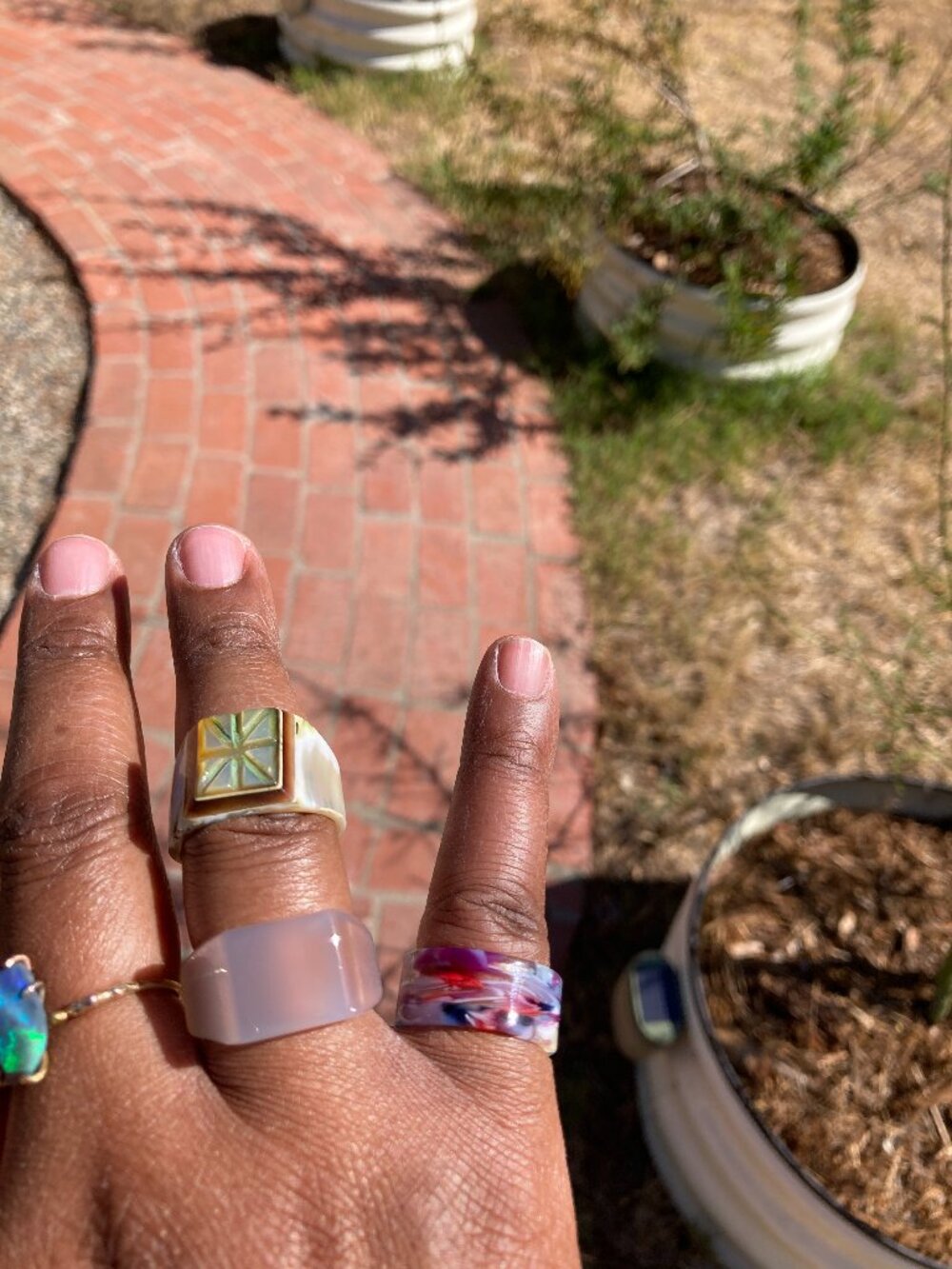 Lot of 3 non-metal rings (carved agate, acrylic, carved mother of pearl)